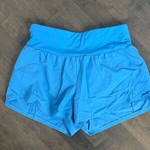 CALIA by Carrie Underwood kick-up mid-rise Athletic Shorts